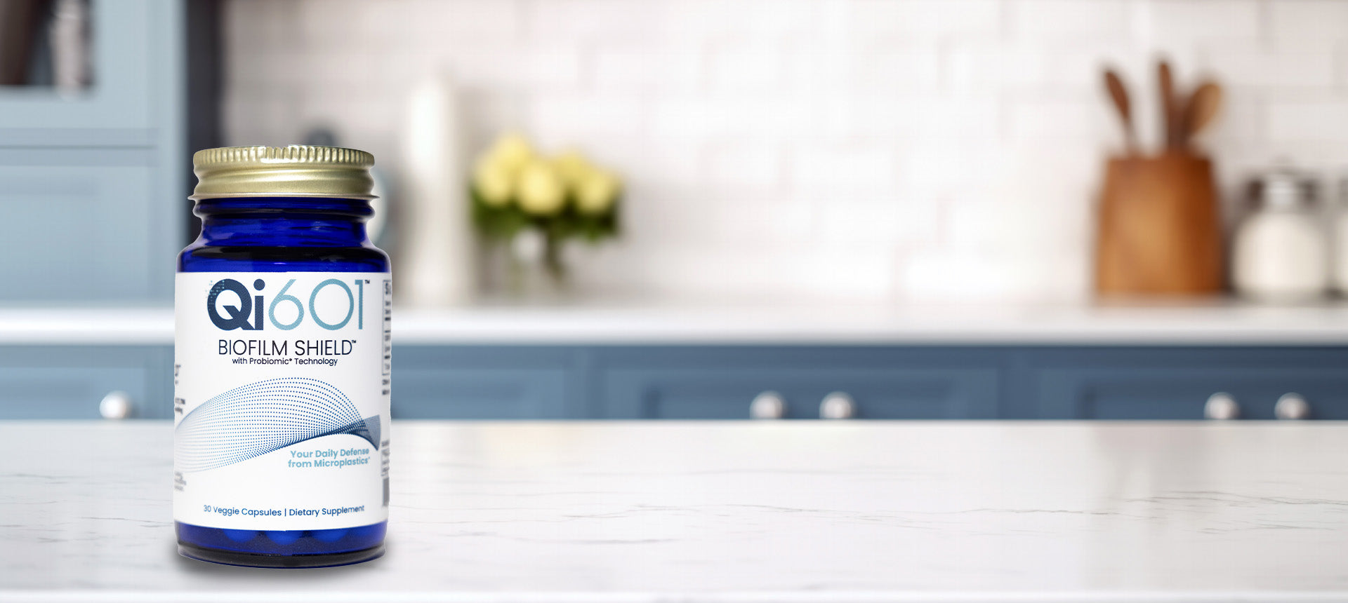 QiBot Biofilm Shield supplement bottle on a kitchen counter